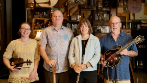 The O'Shanigans family is Margaret Ball, Katrina Mackey, Phil Robinson, and Michael Ludgate