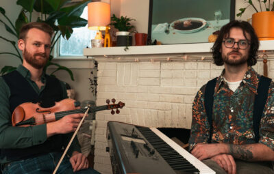 Oliver with fiddle and Alex at the keyboard