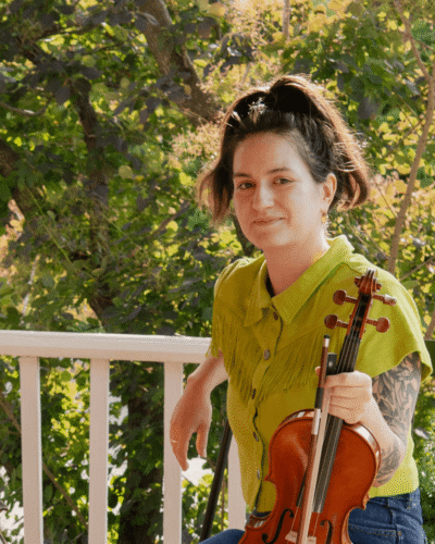Clara with fiddle.